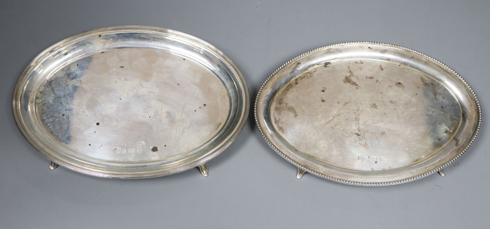 Two 1930s George III style silver teapot stands, Barker Brothers Silver Ltd, Birmingham, 1930, 17.6cm & 18.3cm, 10.5oz.